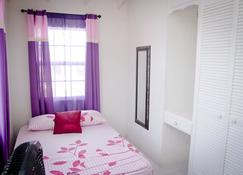 Looking for a quiet suburban get away then visit us at #77, West Terrace Barbado - Fitts Village - Bedroom