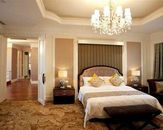 Zheshang Star International Hotel - Fu-šun - Ložnice