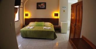 Hotel Los Algarrobos - San Cristobal - Bedroom