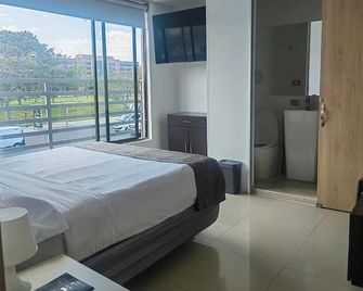 هوتل إمباجادا - بوغوتا - غرفة نوم