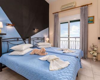 Riviera Seaside Hotel - Benitses - Slaapkamer