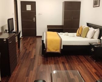 Vedic Village Sriperumbudur - Srīperumbūdūr - Schlafzimmer