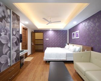 Hotel Ambassador - Indore - Bedroom