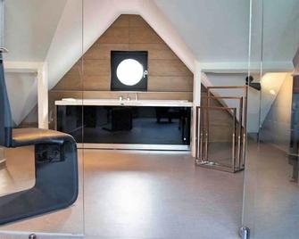Les Béthunoises - Suites design, Spa et Sauna - Béthune - Schlafzimmer