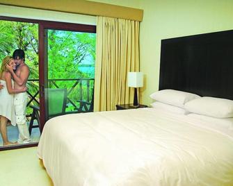 Playa Tortuga Hotel And Beach Resort - Bocas del Toro - Schlafzimmer