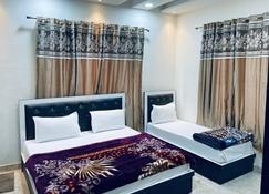 Goroomgo Yuvraj Residency Amritsar - 阿姆利則 - 臥室
