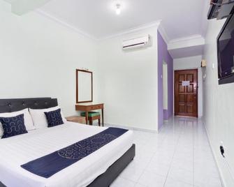 Capital O 89484 Teluk Batik Resort - Lumut - Chambre