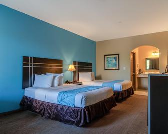 Moulton Inn & Suites By OYO - Moulton - Bedroom