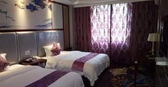 Dancing Ray Hotel - Foshan - Sypialnia