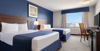 Travelodge by Wyndham Timmins - Timmins - Bedroom