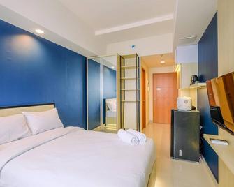 Comfy And Minimalist Studio At Evenciio Margonda Apartment - Depok - Bedroom