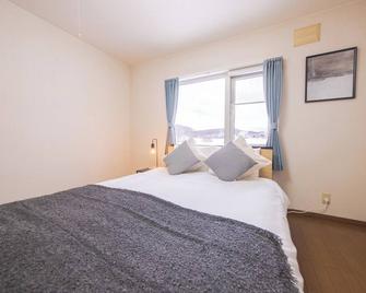 Furano Ski Resort is right next to you The snowy / Furano Hokkaidō - Furano - Habitación