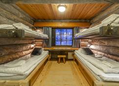 Kuukkeli Log Houses Porakka Inn - Saariselka - Bedroom