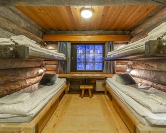 Kuukkeli Log Houses Porakka Inn - Saariselka - Bedroom