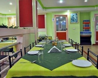 Munnar Inn - Munnar - Restaurant