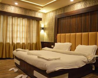 Hotel Outlook - Pahalgam - Schlafzimmer