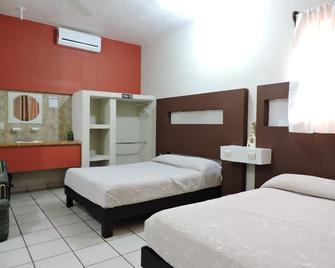 Hotel Raga Inn - Tamasopo - Slaapkamer