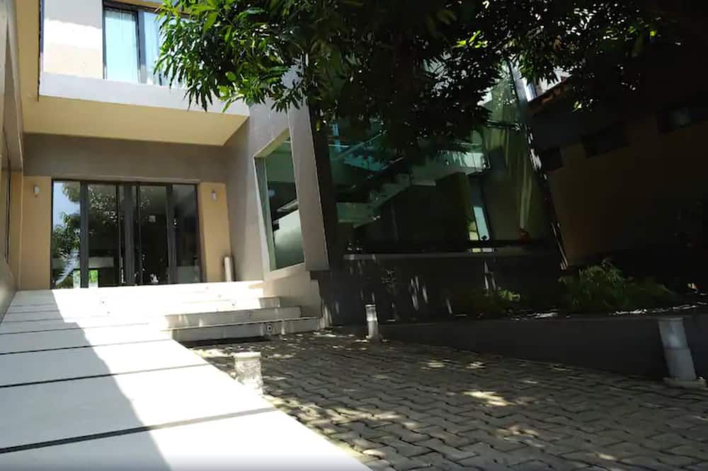 Magno Suites - מאלאבו - חדר שינה