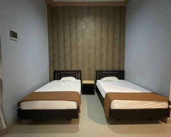 Hotel O near Universitas Palangka Raya - Palangkaraya - Bedroom