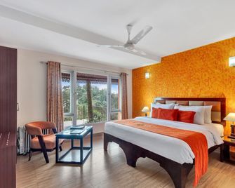 كلوب ماهيندرا موسوري - موسوري - غرفة نوم