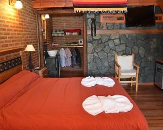 Lauquen Pilmaiquen y spa - Villa de Merlo - Bedroom