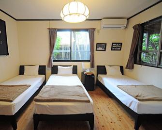 Hibiscus Inn Nakijin - Nakijin - Makuuhuone