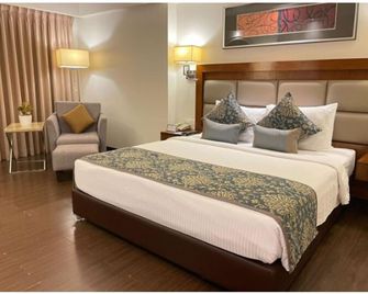 Paradigm Sarovar Portico Kakinada - Kakinada - Спальня