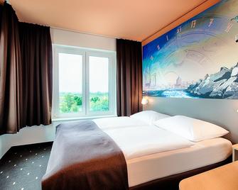 بي آند بي هوتول روستوك هافين - روستوك - غرفة نوم