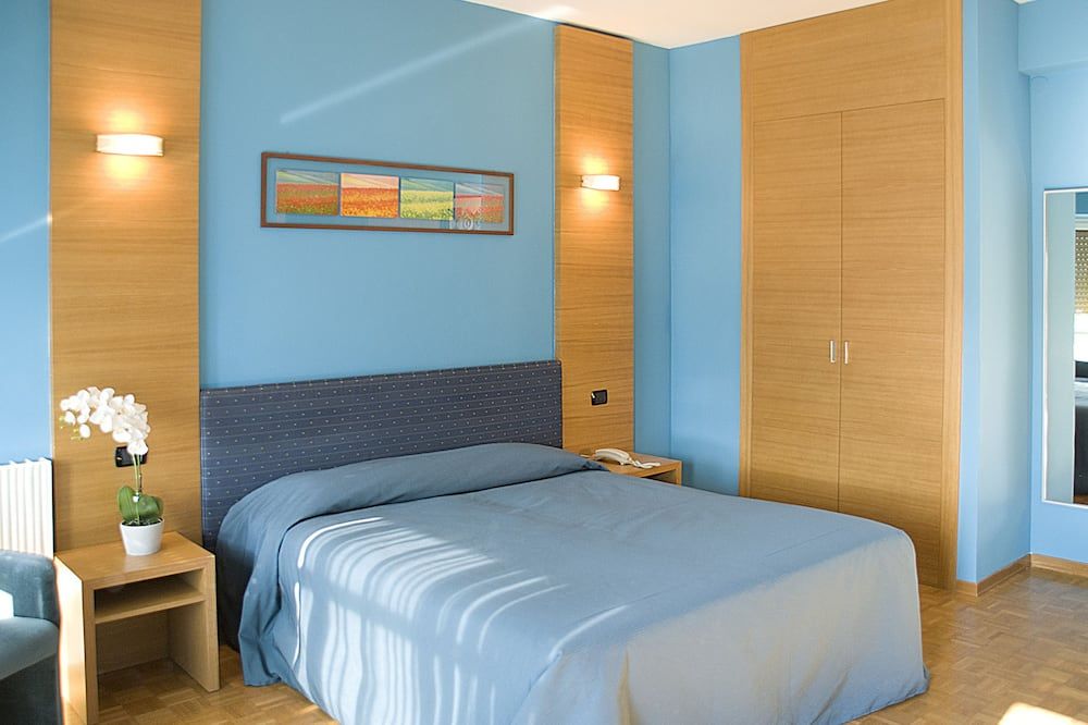 هوتل كلاريسي - سبوليتو - غرفة نوم