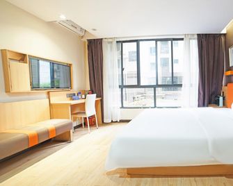 7 Days Premium Hotel Guilin Seven Star Internation - גילין - חדר שינה