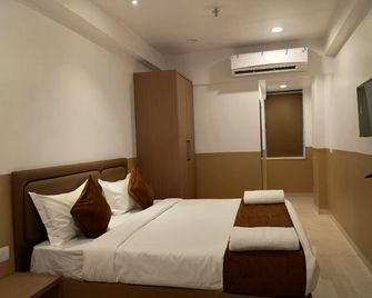 Hotel Sagar Presidency By Buesoco Hosp. Pvt. Ltd. - Daman - Ložnice