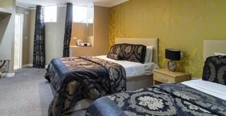 Stuart Hotel - Luton - Phòng ngủ