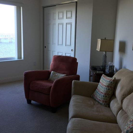 Living room view of Upscale 9th Floor Water-Front 3 Br Condo In Downtown Fort Myers