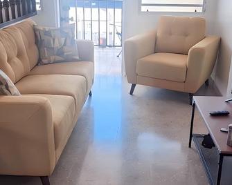 Mont Résidence offering a Loft and 3 Bedroom Apartment steps from the ferry - Vieques - Living room
