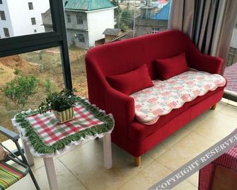 Leyouyou Garden Inn - Jiujiang - Wohnzimmer