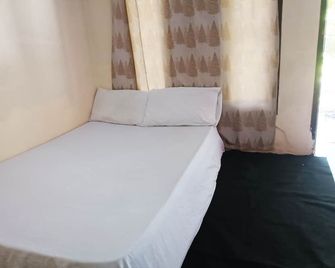 Hotel O Yuda Family Homestay Near Desa Wisata Hijau Bilebante - Mataram - Makuuhuone