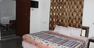Phisbond Hotels - Uyo - Bedroom