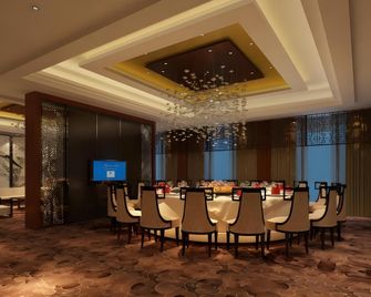Tongbao Gloria Grand Hotel - يونتشنغ - مطعم