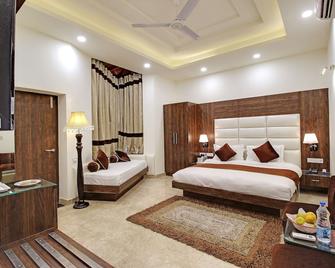 Wood castle Spa & Resort - Rāmnagar - Makuuhuone