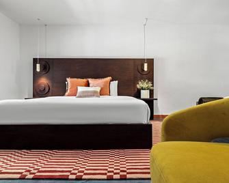 Gruene Outpost River Lodge - 紐布朗費爾斯 - 臥室
