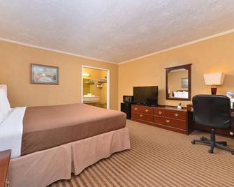 Executive Plus Inn & Suites - Elk City - Schlafzimmer
