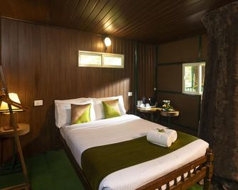 Ela Ecoland Nature Retreat - Munnar - Yatak Odası