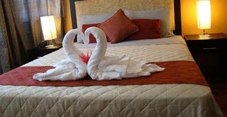 ホテル ポルタル コロニアル - サンホセ - 寝室