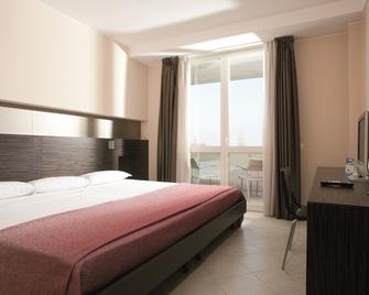 Hotel Rosso Frizzante - San Prospero - Camera da letto