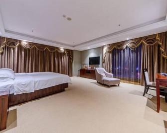 Jiuzhou International Hotel - Yangjiang - Slaapkamer