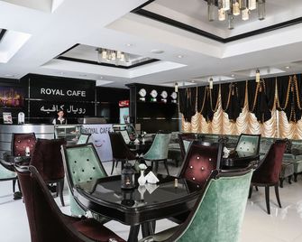 Royal Grand Suite Hotel - Sharjah - Restaurante