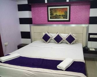 Hotel Arya Palace - Bhubaneswar - Bedroom