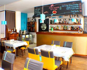 Murex Plaza Hotel & Suites - Monróvia - Restaurante