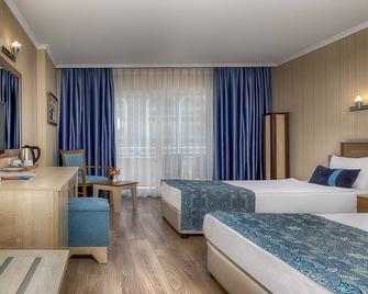 Hotel Stella Beach - Okurcalar - Bedroom