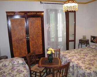 Guest House Al Gattopardo - Favignana - Schlafzimmer
